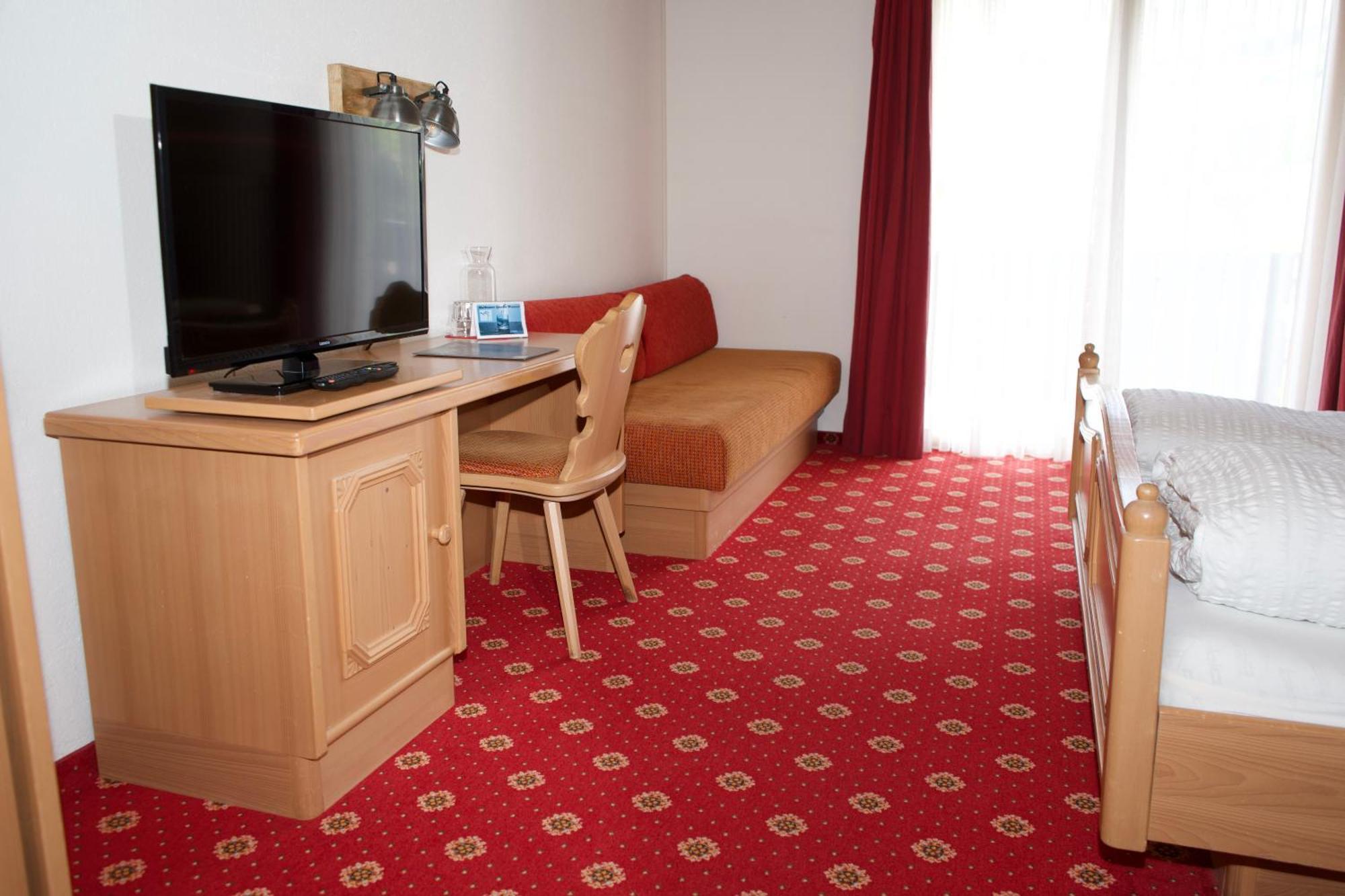 Voegeli Alpenhotel มัลบุน ภายนอก รูปภาพ